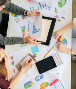 Business presentation with charts and graphs.